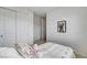 Bright bedroom featuring a closet, a comfortable twin bed, and neutral decor at 350 Gandara St, Las Vegas, NV 89138