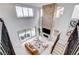 Aerial view of the great room, showcasing stone fireplace, living area, and access to the backyard at 350 Gandara St, Las Vegas, NV 89138