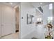 Spacious hallway featuring high ceilings, marble floors, and access to a powder room at 350 Gandara St, Las Vegas, NV 89138