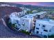 View of modern multi-Gathering homes on a hillside at 358 Solitude Peak Ln, Henderson, NV 89012