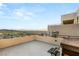 Large balcony with tiled floors, hot tub, and incredible views of the city and mountains at 358 Solitude Peak Ln, Henderson, NV 89012