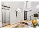 Bright foyer features an elevator, artistic decor, and sleek design at 358 Solitude Peak Ln, Henderson, NV 89012