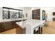 Well-lit kitchen showcasing quartz countertops, stylish cabinetry, and a window with a natural view at 358 Solitude Peak Ln, Henderson, NV 89012