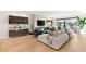 Open living area featuring a fireplace, custom bar, and comfortable seating at 358 Solitude Peak Ln, Henderson, NV 89012