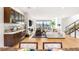 Spacious living room with custom built-ins, plush seating, and a view at 358 Solitude Peak Ln, Henderson, NV 89012