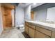 Modern bathroom featuring a walk-in shower, tile flooring, and a granite vanity at 360 E Desert Inn Rd # 807, Las Vegas, NV 89109