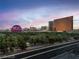 Stunning city view showcasing the Wynn, Sphere, and the High Roller against a vibrant sunset backdrop at 360 E Desert Inn Rd # 807, Las Vegas, NV 89109