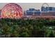 Beautiful city view highlighting the Sphere, the High Roller, and lush green trees in foreground at 360 E Desert Inn Rd # 807, Las Vegas, NV 89109