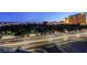 Panoramic city view featuring the Sphere, Wynn, and other landmarks with vehicle light trails in the foreground at 360 E Desert Inn Rd # 807, Las Vegas, NV 89109