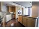 Bright kitchen with stainless steel appliances, granite countertops, and light wood cabinets and island at 360 E Desert Inn Rd # 807, Las Vegas, NV 89109