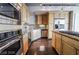 Modern kitchen featuring stainless steel appliances, granite countertops, and light wood cabinetry at 360 E Desert Inn Rd # 807, Las Vegas, NV 89109