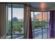 Living room with large windows showcasing a stunning view of the Sphere and city skyline at 360 E Desert Inn Rd # 807, Las Vegas, NV 89109