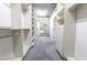 Spacious walk-in closet with ample shelving and storage space for an organized wardrobe at 360 E Desert Inn Rd # 807, Las Vegas, NV 89109