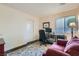 Bedroom featuring a desk, comfortable seating, and natural light from the window at 3629 Ferrell St, North Las Vegas, NV 89032