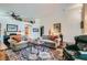 Bright living room showcasing high ceilings, hardwood floors, and plenty of seating at 3629 Ferrell St, North Las Vegas, NV 89032