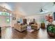 Bright living room with hardwood floors, high ceilings and a neutral color palette at 3629 Ferrell St, North Las Vegas, NV 89032