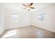 Well lit bedroom with two windows and neutral paint and flooring at 37 Late Harvest Ave, Pahrump, NV 89060