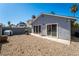 Low maintenance backyard with gravel, block wall and patio; ready for personalization at 4036 E Ogden Ave, Las Vegas, NV 89110