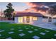 Charming detached home features an easy-care lawn and manicured landscaping at 4061 W Eldorado Ln, Las Vegas, NV 89139