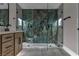 Glass shower bathroom with quartz countertop and cabinets at 4061 W Eldorado Ln, Las Vegas, NV 89139