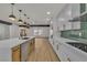 Bright, modern kitchen with a spacious center island and stainless steel appliances at 4061 W Eldorado Ln, Las Vegas, NV 89139