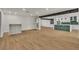 Open-concept living room featuring kitchen with large center island at 4061 W Eldorado Ln, Las Vegas, NV 89139
