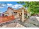 Charming backyard with a covered patio, tiled flooring and well-manicured landscaping at 4617 Mancilla St, Las Vegas, NV 89130