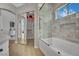 Bright bathroom features a shower over tub and access to the walk-in closet at 4617 Mancilla St, Las Vegas, NV 89130