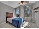 Bright bedroom with a vaulted ceiling, large windows, and a comfortable bed at 4617 Mancilla St, Las Vegas, NV 89130