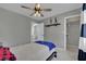 bedroom features decorative wall designs and direct access to ensuite bathroom at 4617 Mancilla St, Las Vegas, NV 89130