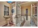 Inviting front entrance featuring a decorative iron gate and a charming courtyard area at 4617 Mancilla St, Las Vegas, NV 89130
