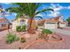 Charming home showcasing desert landscaping and a mature palm tree at 4617 Mancilla St, Las Vegas, NV 89130