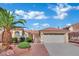 Charming home with well-manicured front yard and mature palm tree at 4617 Mancilla St, Las Vegas, NV 89130
