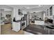 Stylish kitchen boasts stainless steel appliances, black granite countertops, and opens to the living spaces at 4617 Mancilla St, Las Vegas, NV 89130