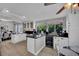 Modern kitchen with stainless appliances and an adjacent dining area at 4617 Mancilla St, Las Vegas, NV 89130