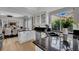 Well-lit kitchen features granite countertops, stainless steel appliances, and an undermount sink at 4617 Mancilla St, Las Vegas, NV 89130