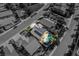 Aerial view of a home showcasing the backyard pool, patio, and well-maintained landscaping at 4937 Semifonte Dr, Pahrump, NV 89061