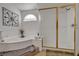 Elegant bathroom showcasing a soaking tub, glass shower, and stylish fixtures at 5080 Plymouth Bay Ct, Las Vegas, NV 89141