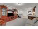 Inviting living room featuring custom built-ins, neutral walls, and lots of space at 5080 Plymouth Bay Ct, Las Vegas, NV 89141