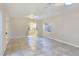 Open bedroom features tile flooring, closet and natural light at 5159 N Monte Cristo Way, Las Vegas, NV 89149