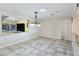 The dining room boasts tile flooring, granite accents, and lots of natural light at 5159 N Monte Cristo Way, Las Vegas, NV 89149