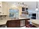 Granite countertops and stainless-steel appliances are the highlights of this home's beautiful kitchen at 5159 N Monte Cristo Way, Las Vegas, NV 89149