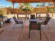 Outdoor seating area with covered patio, offering ample space for gatherings at 542 Bonelli Ave, Overton, NV 89040