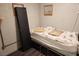 Cozy basement bedroom featuring a basic bed frame and minimal decor, simple and functional at 542 Bonelli Ave, Overton, NV 89040