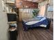 Cozy living area with vintage decor, with creative wall finishes and vinyl flooring at 542 Bonelli Ave, Overton, NV 89040