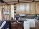 Kitchenette with compact appliances in combination space with vintage decor at 542 Bonelli Ave, Overton, NV 89040