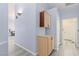 Hallway cabinets provide extra storage for cleaning supplies and household essentials at 5441 Rose Hills St, Las Vegas, NV 89149