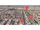 Aerial view of a residential area near S. Jones Blvd. and W. Silverado Ranch Blvd. close to shopping centers and schools at 5661 Brimstone Hill Ave, Las Vegas, NV 89141