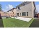 An attractive backyard with an outdoor patio and jacuzzi at 5661 Brimstone Hill Ave, Las Vegas, NV 89141
