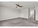 Neutral bedroom with carpet and ceiling fan at 5661 Brimstone Hill Ave, Las Vegas, NV 89141